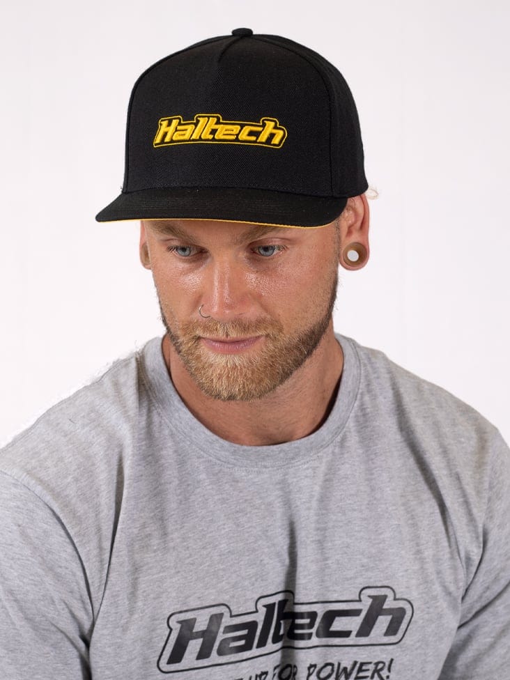 HALTECH Haltech Snapback Cap Black with Yellow Logo Size: One size fits all Haltech Snapback Cap Black with Yellow Logo Size: One size fits all SR