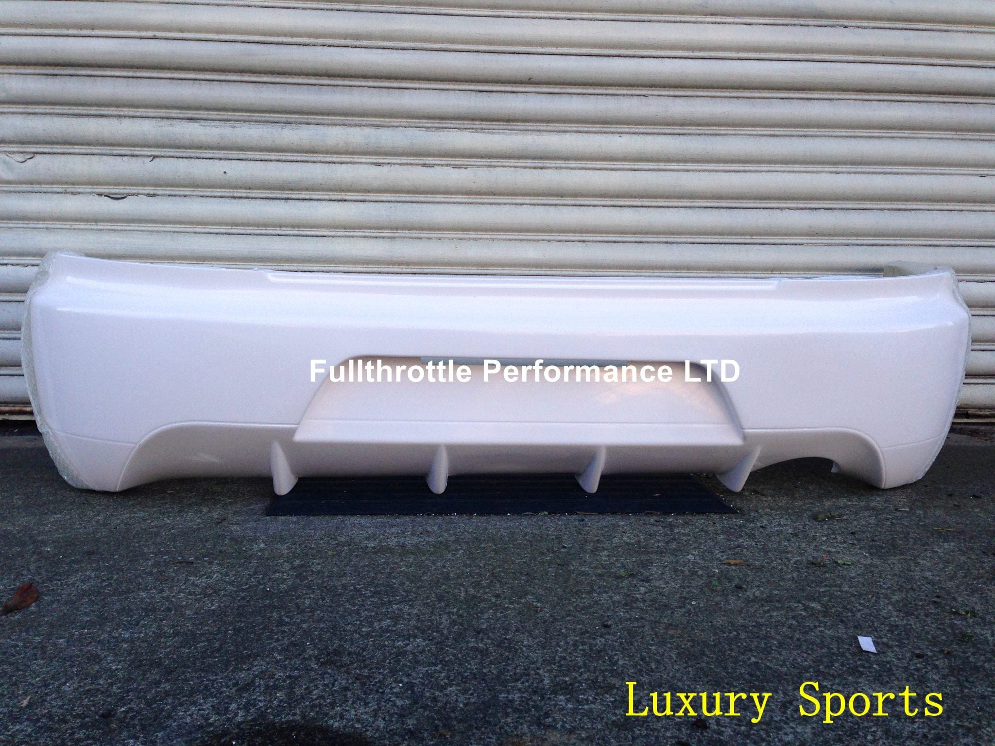Luxury Sports Luxury Sports Factory EVO 9 Style Rear Bumper For Mistubishi EVO 7-9 SR