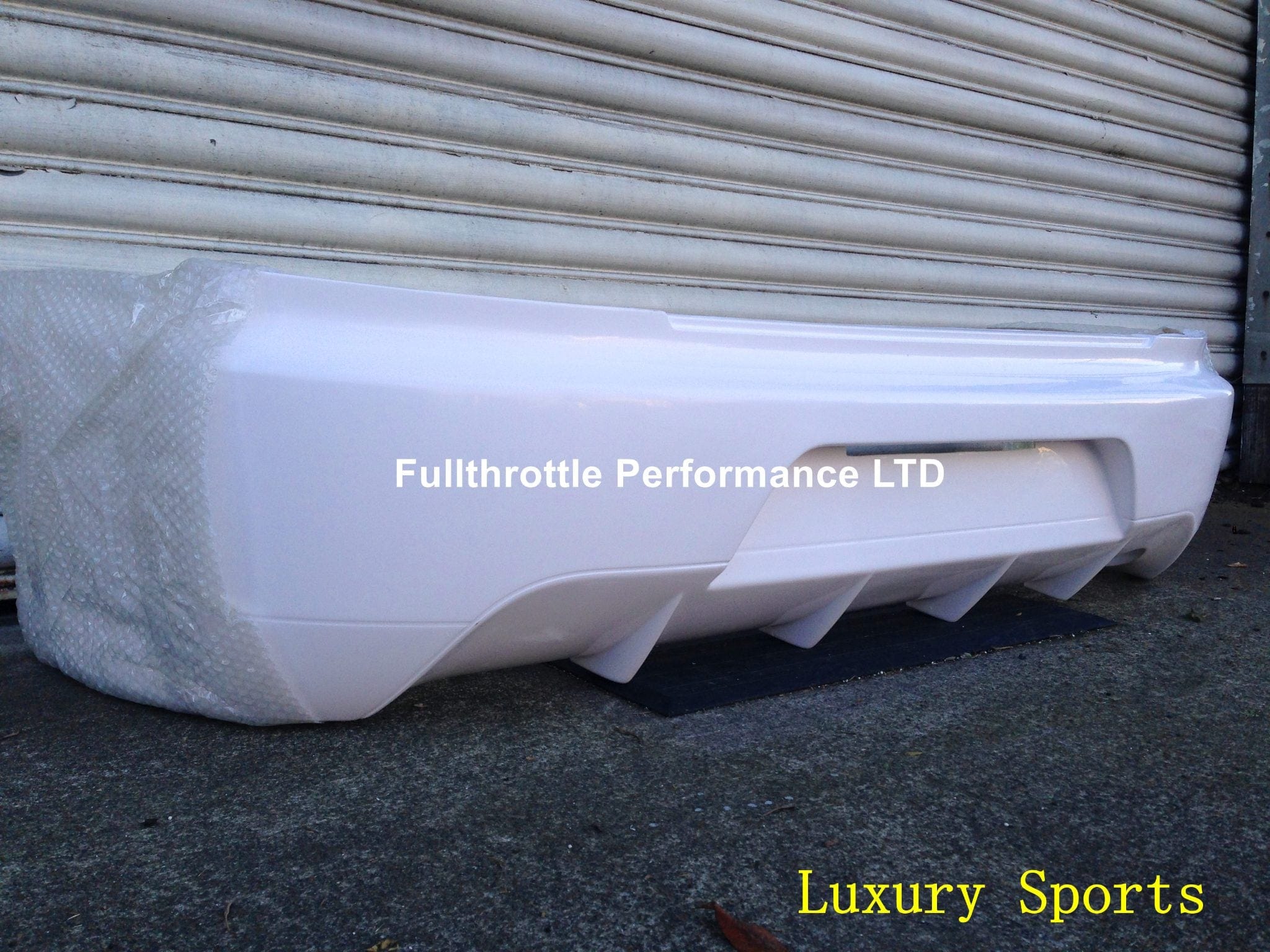 Luxury Sports Luxury Sports Factory EVO 9 Style Rear Bumper For Mistubishi EVO 7-9 SR