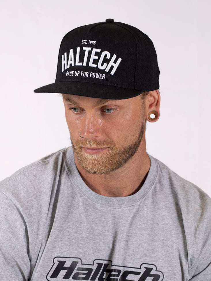 Haltech Snap Back Black with White Text Size: One size fits all.