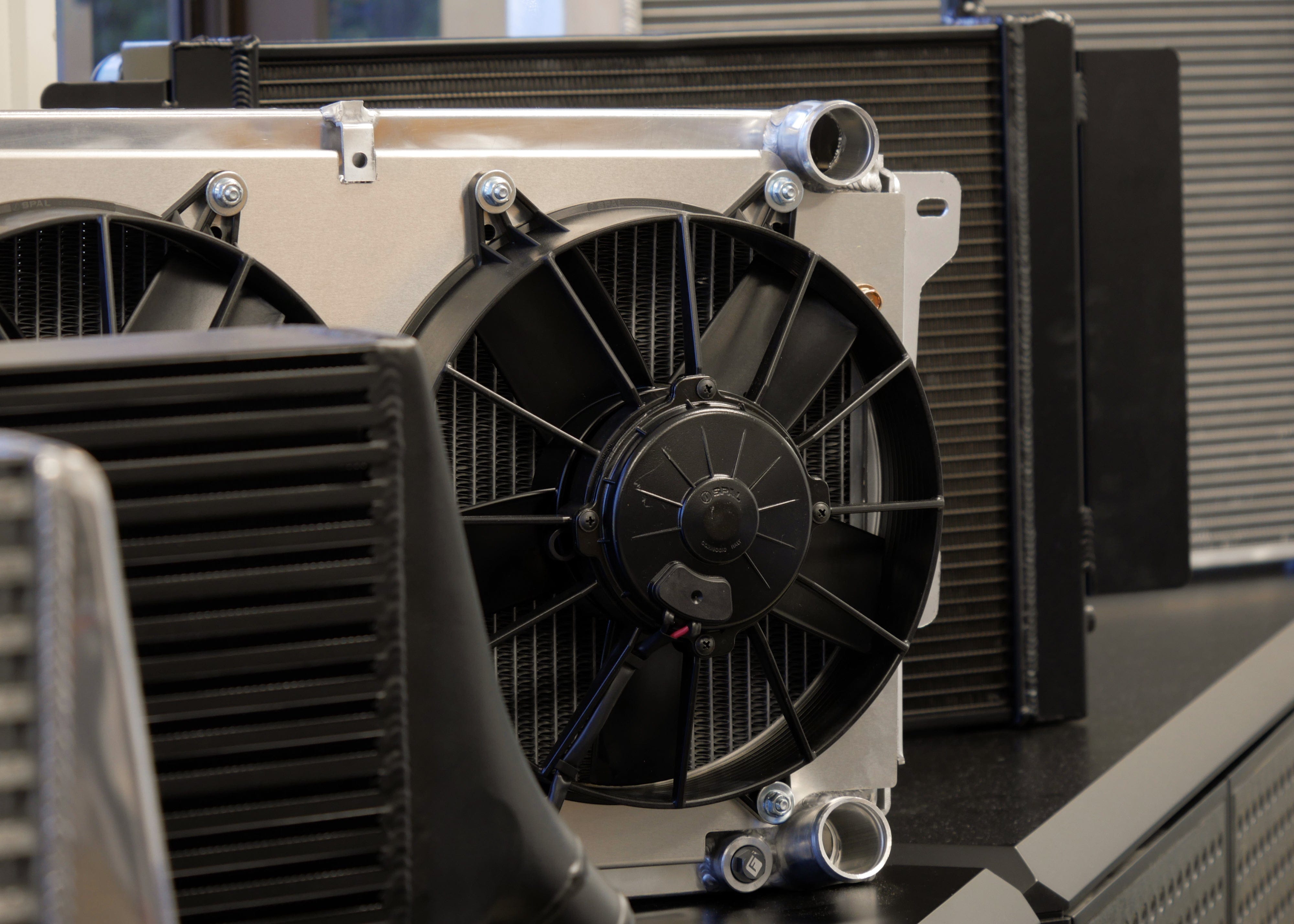 Fenix Cooling Performance Fans & Shrouds Black [Special Order] / x2 SPAL 1174CFM 10" Mazda RX2-5 & RX7 Series 1 / 2 [Down-Flow] Fan Shroud Kit SR